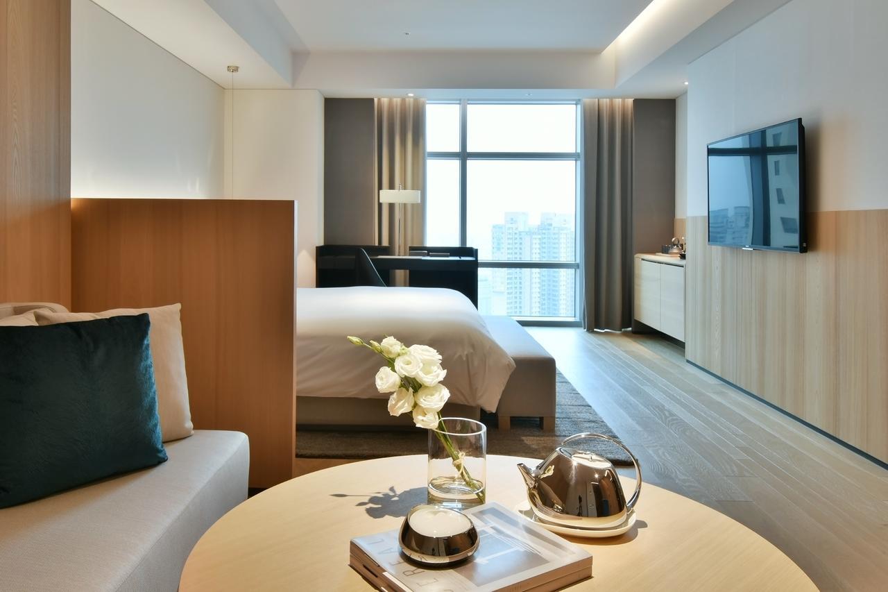Silks Club Hotel Kaohsiung Bagian luar foto Deluxe Room